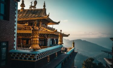 brown and green temple on top of mountain during daytime