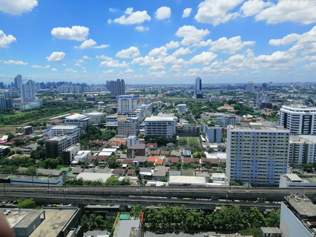 city buildings under blue sky during daytime