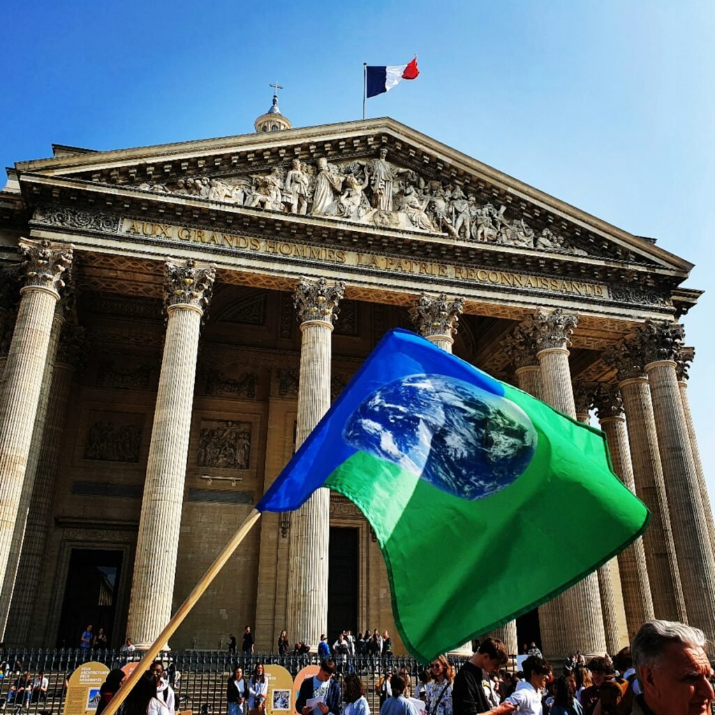 a group of people standing in front of a building