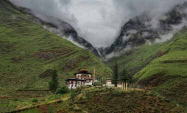 A house in the middle of a mountain range
