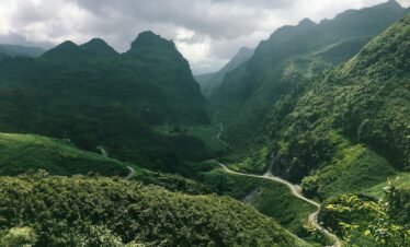 green mountains under white clouds during daytime